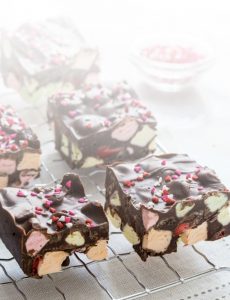 pieces of fudge with marshmallows and sprinkles